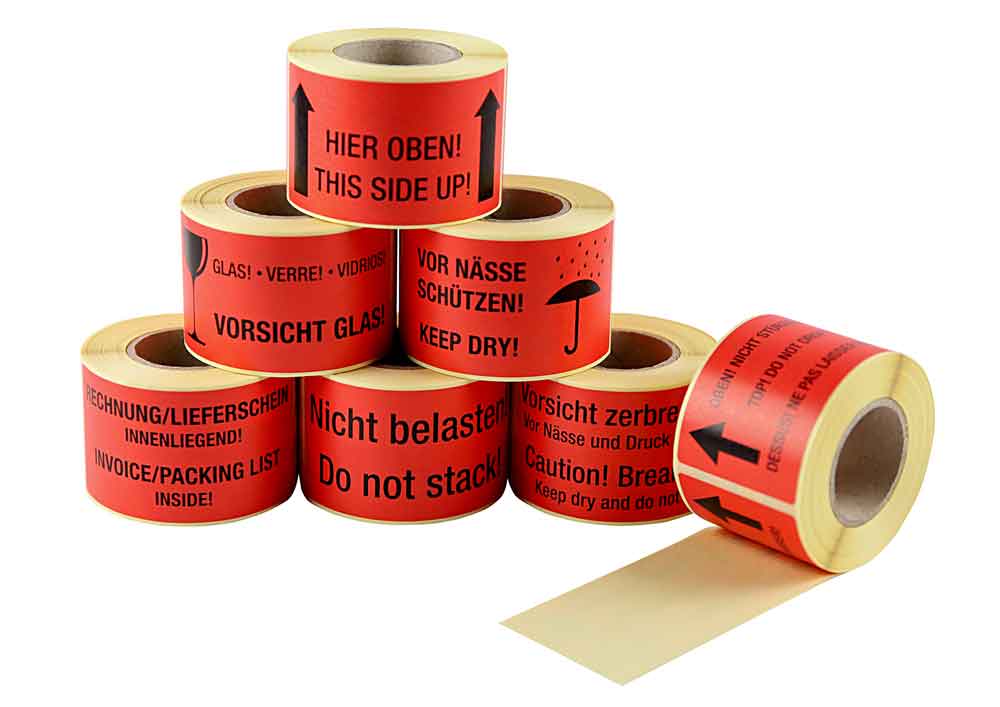 Warn- bzw. Verpackungsetiketten - selbstklebend in Signalrot auf Rolle Warn- bzw. Verpackungsetiketten - selbstklebend in Signalrot auf Rolle