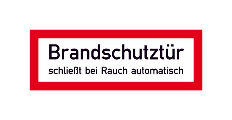 Hinweisschild für die Feuerwehr - Brandschutztür schließt bei Rauch automatisch