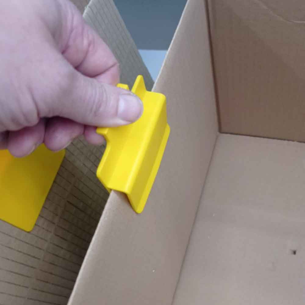 Kartonklammer zum Befüllen, Leeren und Stapeln von Kartons Kartonklammer zum Befüllen, Leeren und Stapeln von Kartons