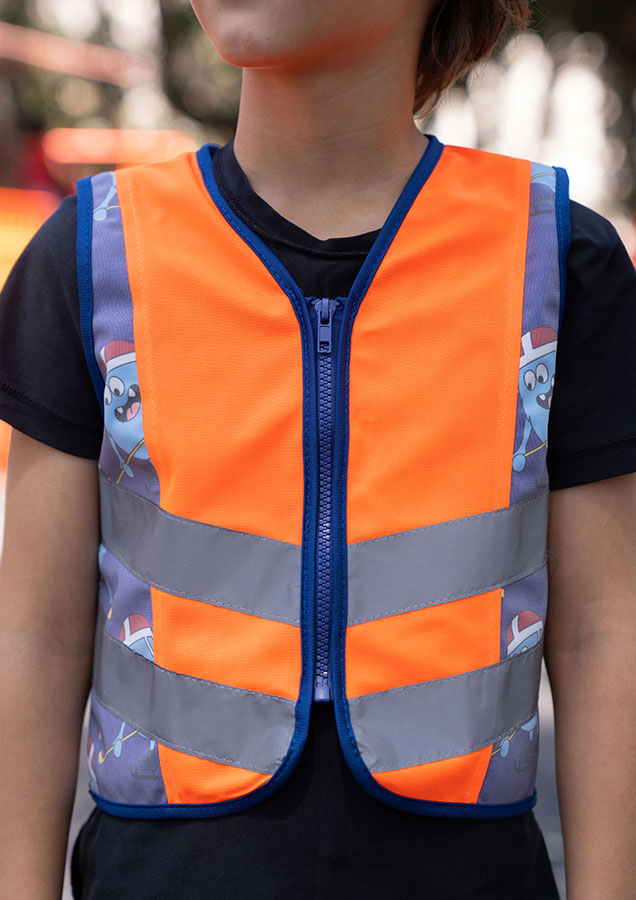 Korntex® Kinder Warnweste Action Line „Sports“ - CO2 Neutral - Signal-Orange/Eishockey - S